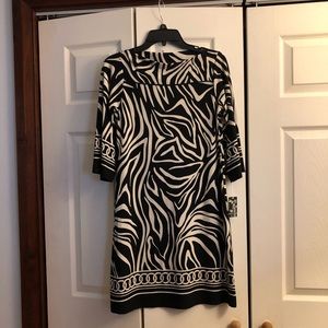 Black animal print knee length dress